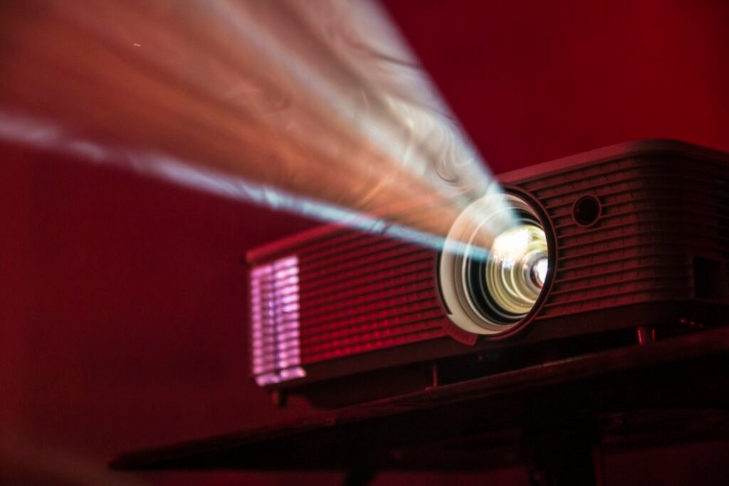 Turned on LED projector on table